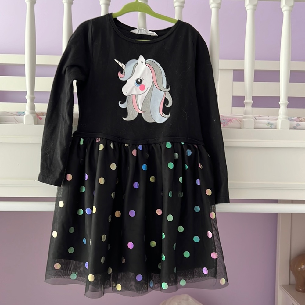 Very cute unicorn dress. Washed but never worn.